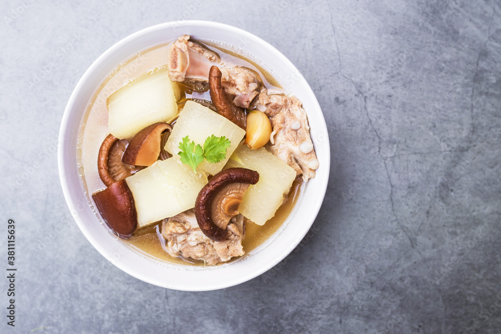 Winter melon soup with pork rib and shiitake mushroom with herbs (Thai clear soup with vegetable). 
