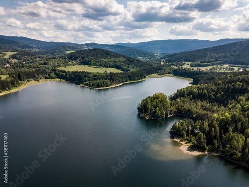 Lake placed to forest countryside