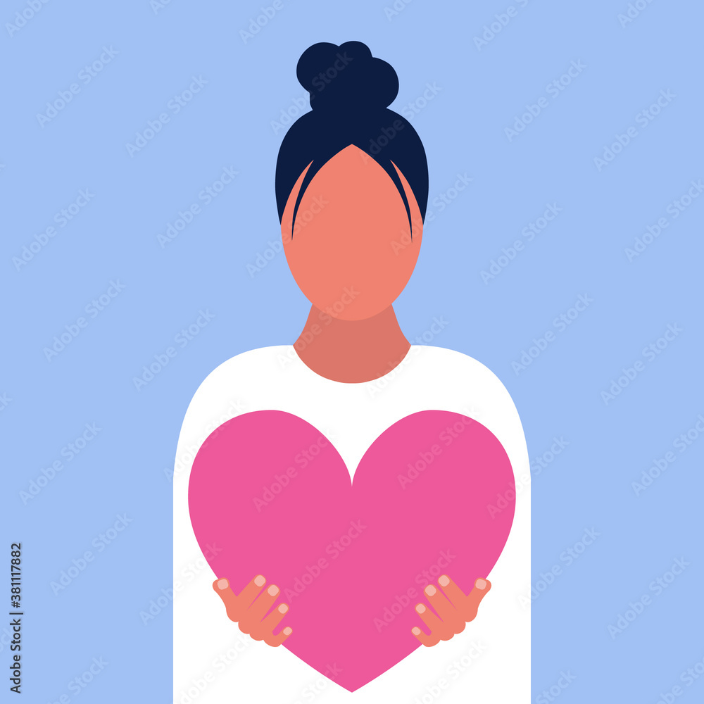 Woman holds big hearts Woman holds big hearts