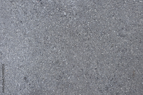 Fototapeta Naklejka Na Ścianę i Meble -  Smooth gray asphalt with a grainy texture