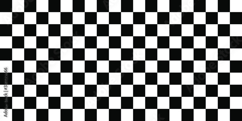 Black and white racing against a checkered pattern background 