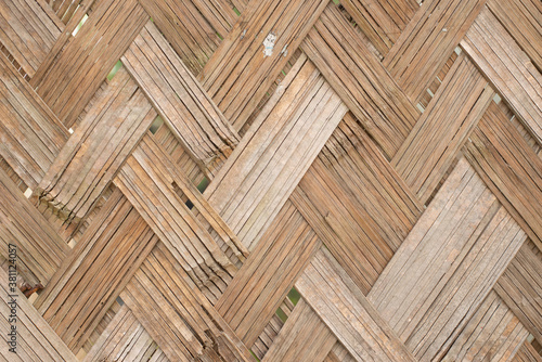 nature background of brown handicraft weave texture bamboo surface.