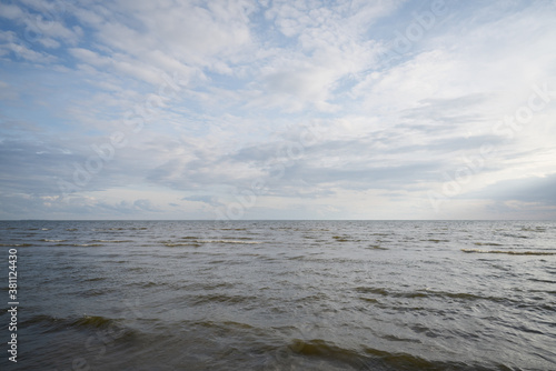 gulf of finland beach with shallow water on a cloudy day
