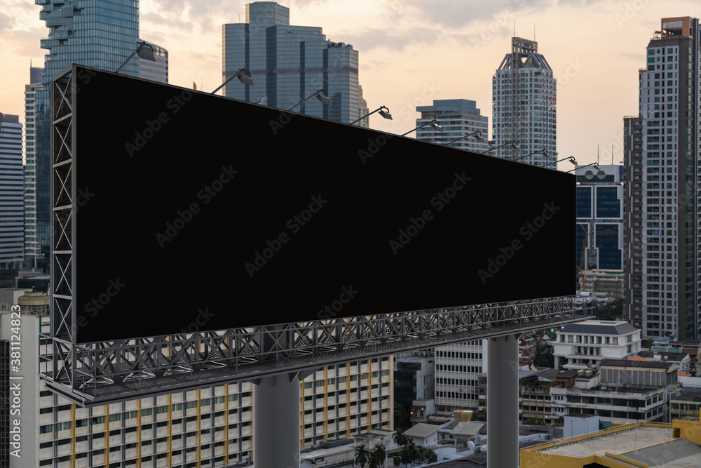 Blank black road billboard with Bangkok cityscape background at sunset. Street advertising poster, mock up, 3D rendering. Side view. The concept of marketing communication to promote or sell idea. Blank black road billboard with Bangkok cityscape background at sunset. Street advertising poster, mock up, 3D rendering. Side view. The concept of marketing communication to promote or sell idea.