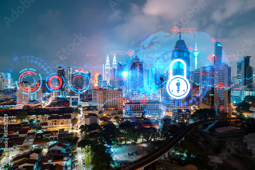 Photography Glowing Padlock hologram, night panoramic city view of Kuala Lumpur, Malaysia, Asia