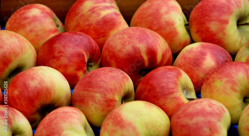 ripe apples display for sale on a farmers market