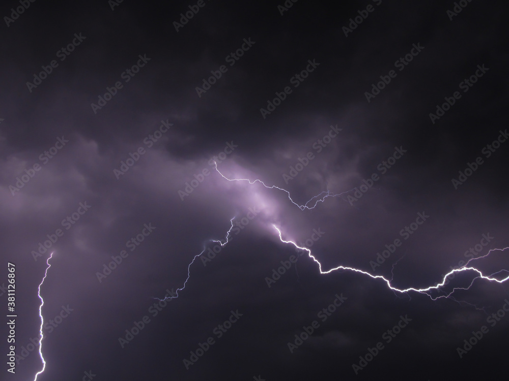 Close up of lightning bolts coming out of a cloud Close up of lightning bolts coming out of a cloud