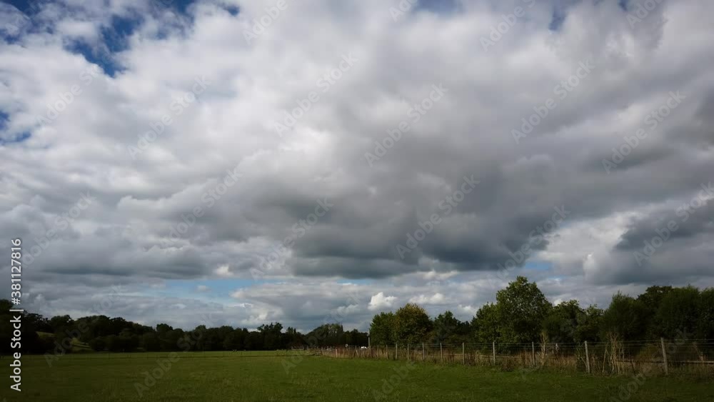 Scenic white clouds on blue sky at River Thames near Windsor. - 4k footage Scenic white clouds on blue sky at River Thames near Windsor. - 4k footage