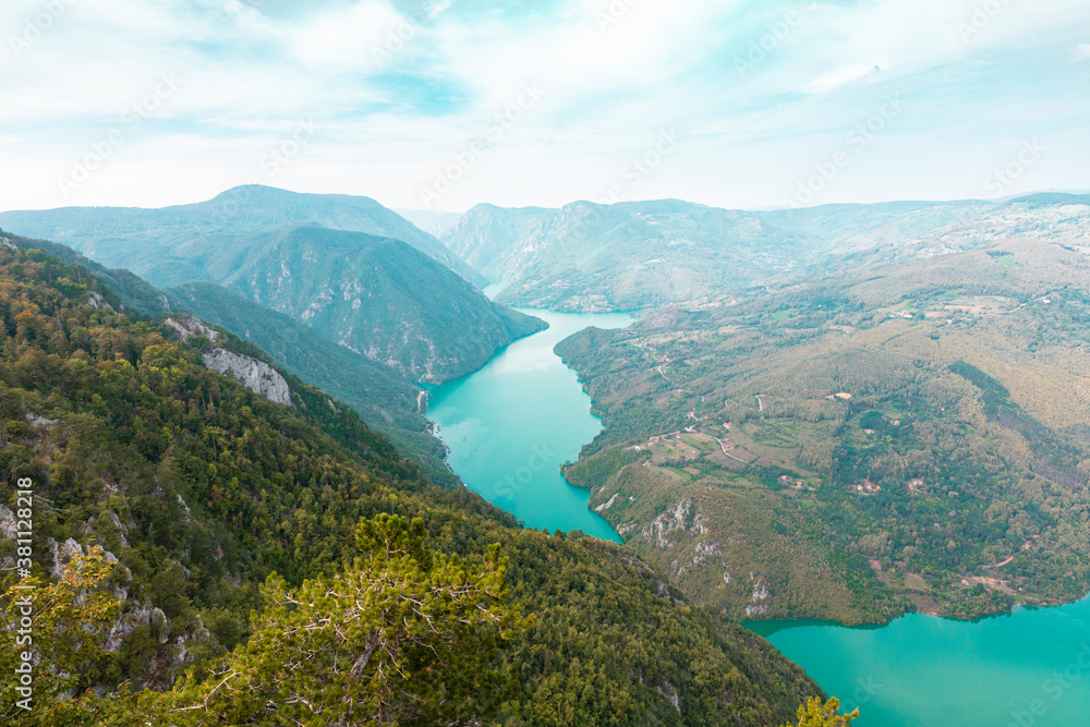 Tara National Park, Serbia. Viewpoint Banjska Stena. View at Drina river canyon and lake Perucac with Focus on the lake and canyon Tara National Park, Serbia. Viewpoint Banjska Stena. View at Drina river canyon and lake Perucac with Focus on the lake and canyon