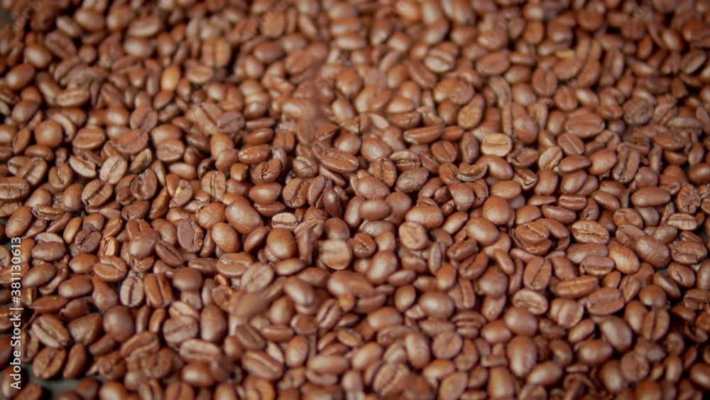 close-up on fragrant brown roasted coffee beans close-up on fragrant brown roasted coffee beans