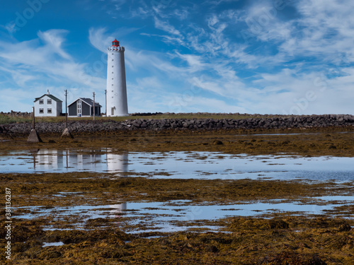 Lighthouse on the island of Grótta near Reykjavik, Iceland. The island is accessible via a causeway at low tide.