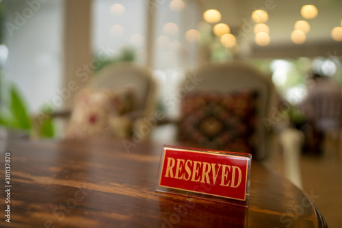 restaurant reservation sign on table 