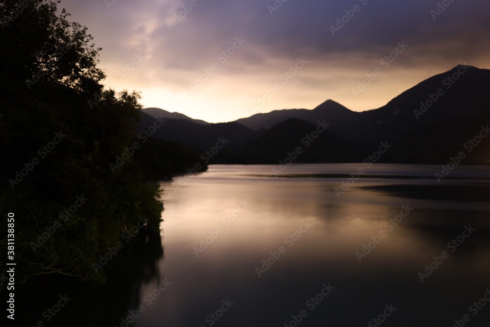 sunset over the lake with river and mountain hong kong