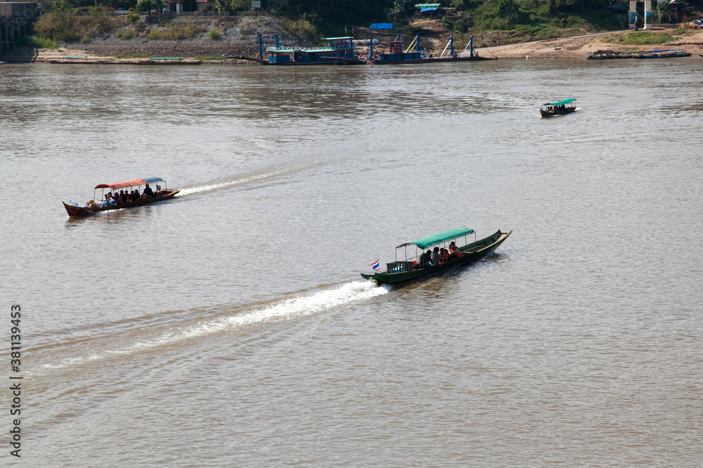 Fototapeta premium Ban Houei Sai 12/23/2013 ferry crossing of Mekong river from Thailand to Laos