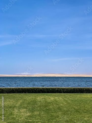 Paracas  bay and natural reserve of Ica in Peru Sea  water  birds  dock  stones.