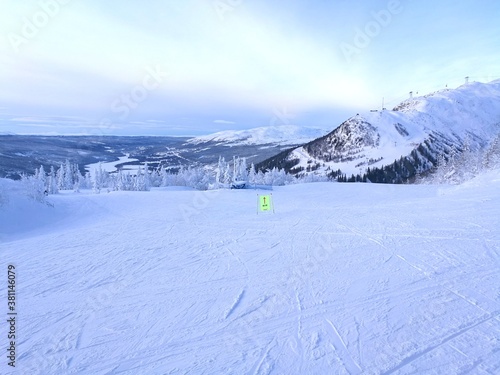 Skiing under a blue sky in the beautiful ski resort of Åre (Aare) Sweden photo