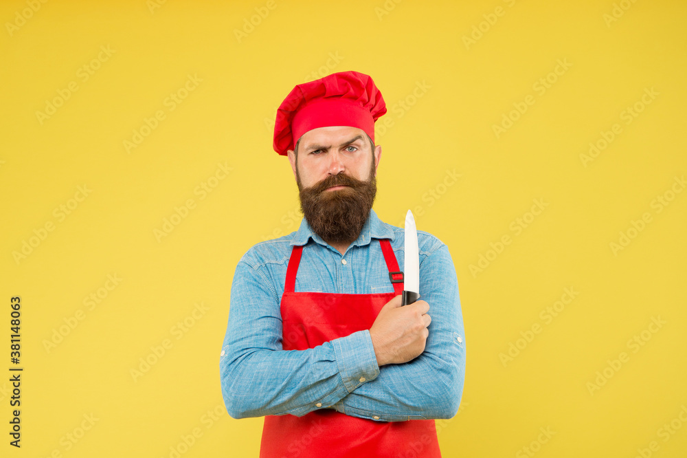 Chef using ceramic knife for cutting fruits and vegetables Chef using ceramic knife for cutting fruits and vegetables