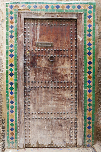 Traditional beautiful door in Fez, Morocco. Typical moroccan architecture.