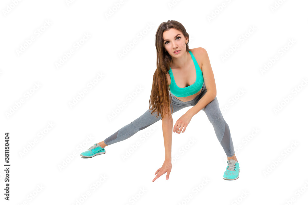 Woman in sportswear doing exercises on the body warm up jogging
Woman in sportswear doing exercises on the body warm up jogging