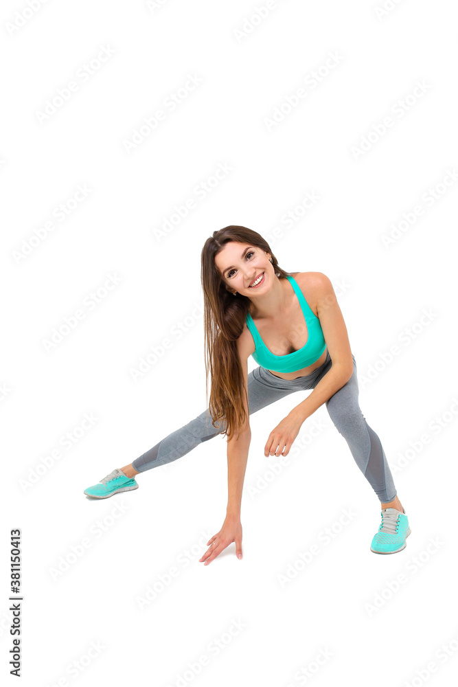 Woman in sportswear doing exercises on the body warm up jogging
Woman in sportswear doing exercises on the body warm up jogging