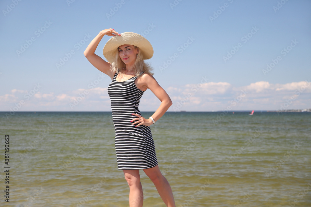 woman on the beach at sea