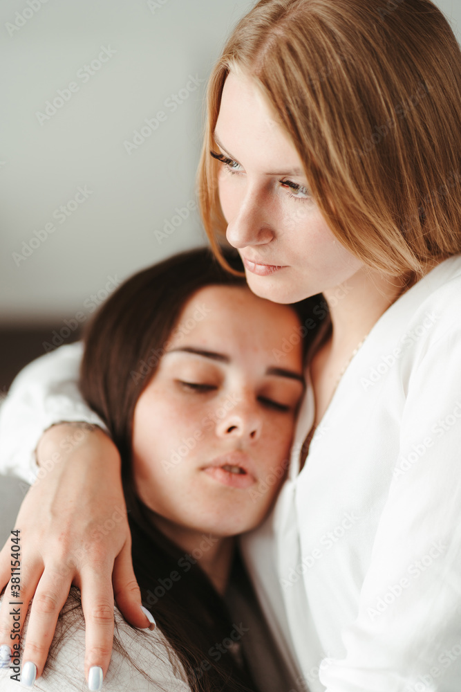 Two young women in love embracing. Relationships