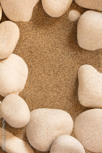 Photography beach sand and white stones center space for writing