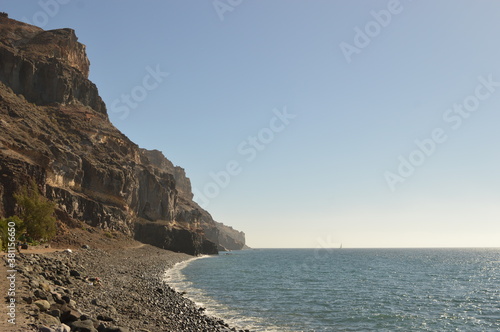 Sunset over the Amadores beach on the stunning island of Gran Canaria in Spain