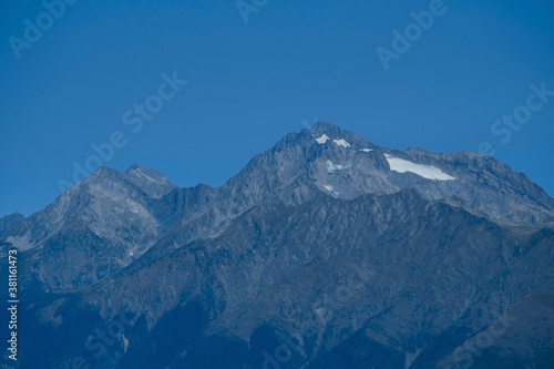 blurred abstract natural background with Mountains in a morning blue mist