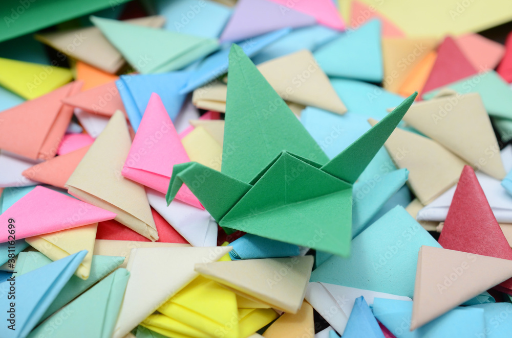 A paper bird with origami background A paper bird with origami background