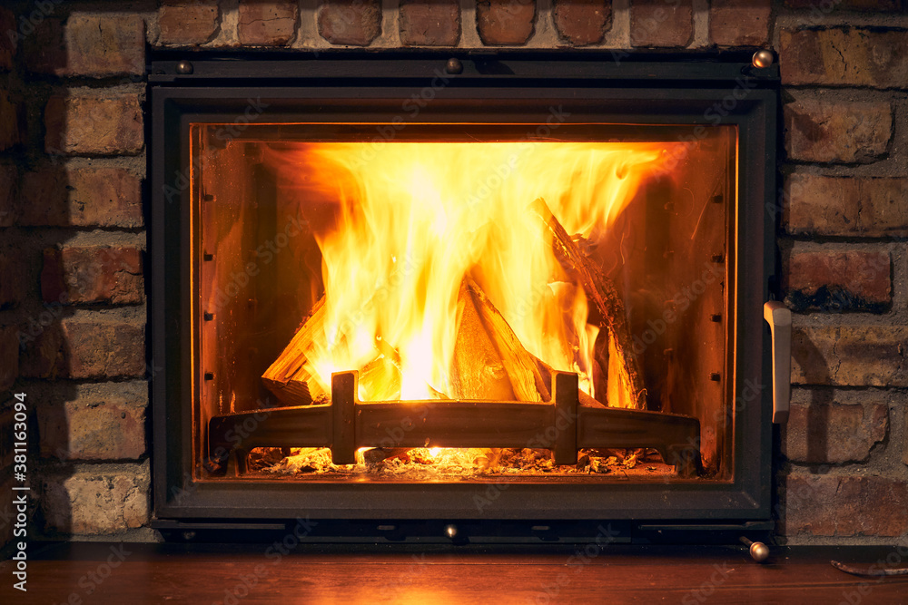 fireplace and fire close view as object or background, brick wall fireplace and fire close view as object or background, brick wall