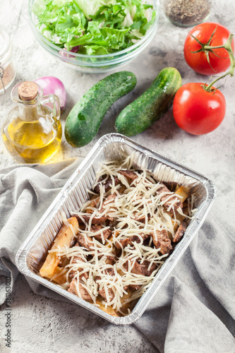 Making Kapsalon, Dutch fast food witch french fries photo