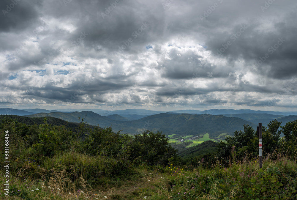 View from ridge of Poloniny national park in summer cloudy blue sky day