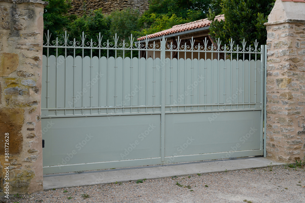 blue green steel gate house portal of a traditional european house blue green steel gate house portal of a traditional european house