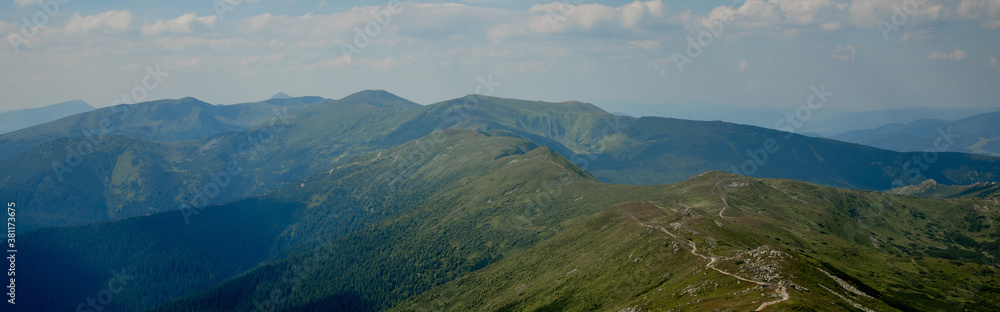 Carpathians mountain range at summer morning. Beauty of wild virgin Ukrainian nature. Peacefulness.