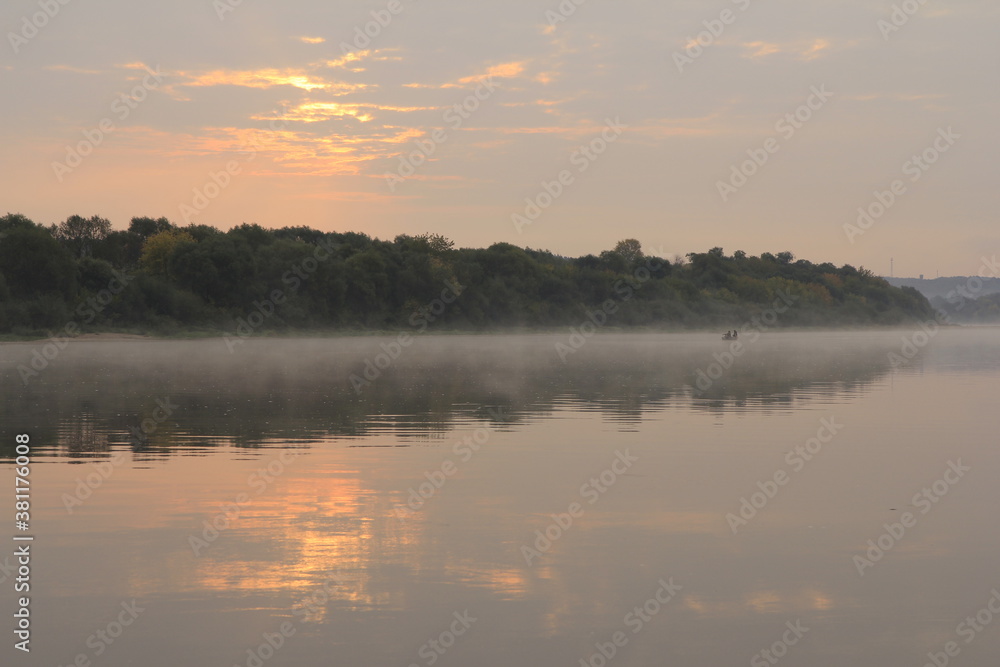 Sunrise of the river in early autumn