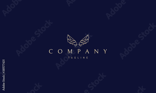 Vector golden logo on which an abstract image of wings in a polygonal style.