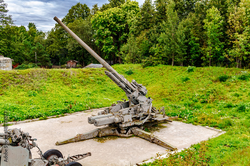 130 Mm Anti-aircraft Gun on the Demidov battery. Kronshtadt, Saint Petersburg, Russia. photo