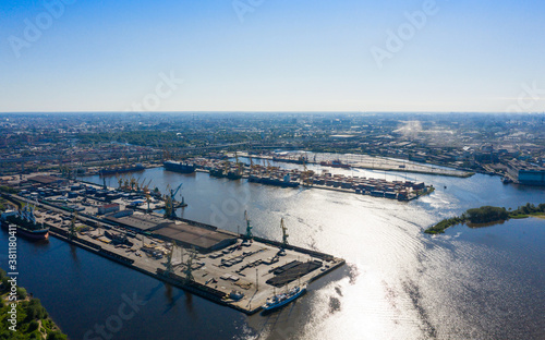 Aerial view of cargo ship, cargo container in warehouse harbor in the Morskie Vorota district in St. Petersburg © miklyxa