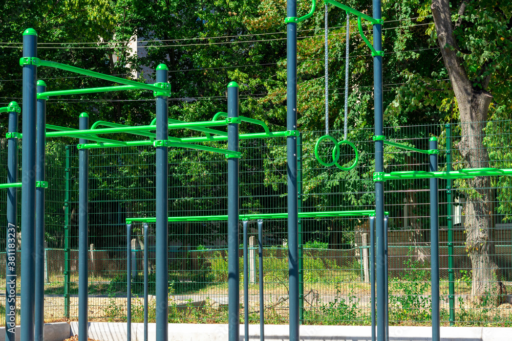 training apparatus .Equipment for free street fitness. Sport, fitness, street workout concept.Sports ground outdoor training apparatus .Equipment for free street fitness. Sport, fitness, street workout concept.Sports ground outdoor