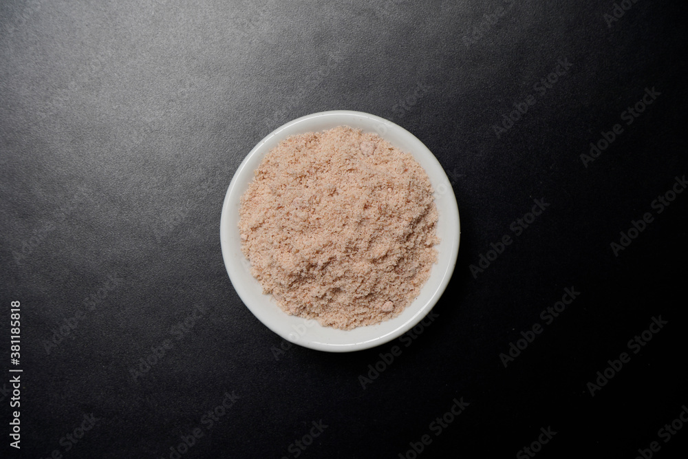 Top View Of Black Salt in Bowl On Dark Background, Kala Namak Top View Of Black Salt in Bowl On Dark Background, Kala Namak