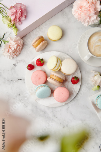 French cake macarons on a marble background