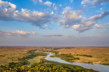 Leinwandbilder Lavendelfarbene Motive shallow and wide Dismal River flowing through Nebraska Sandhills at Nebraska National Forest, aerial view of afternoon scenery in early fall  © MarekPhotoDesign.com