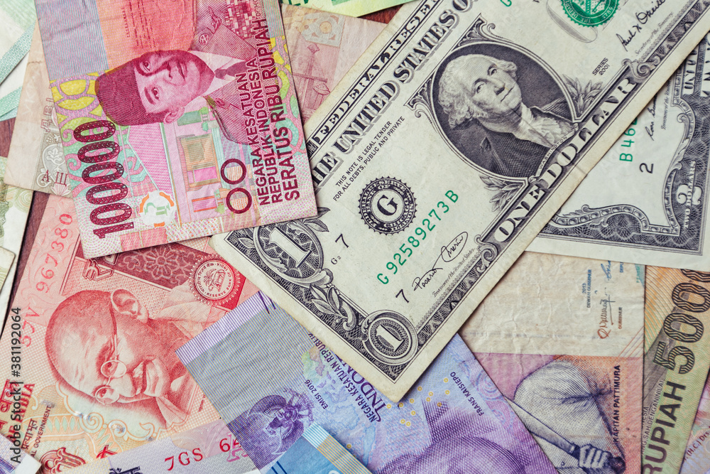 Obraz premium Different money background. 1 dollar in center