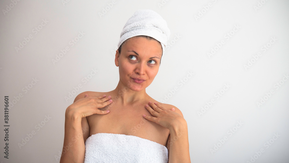 Beautiful young woman in bath towels. Negative space or copy space for text. Beautiful young woman in bath towels. Negative space or copy space for text.