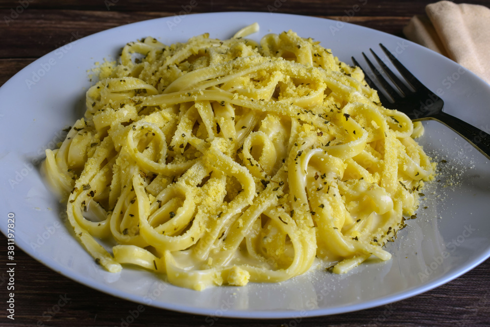 fettuccine with alfdo sauce and parmesan cheese fettuccine with alfdo sauce and parmesan cheese