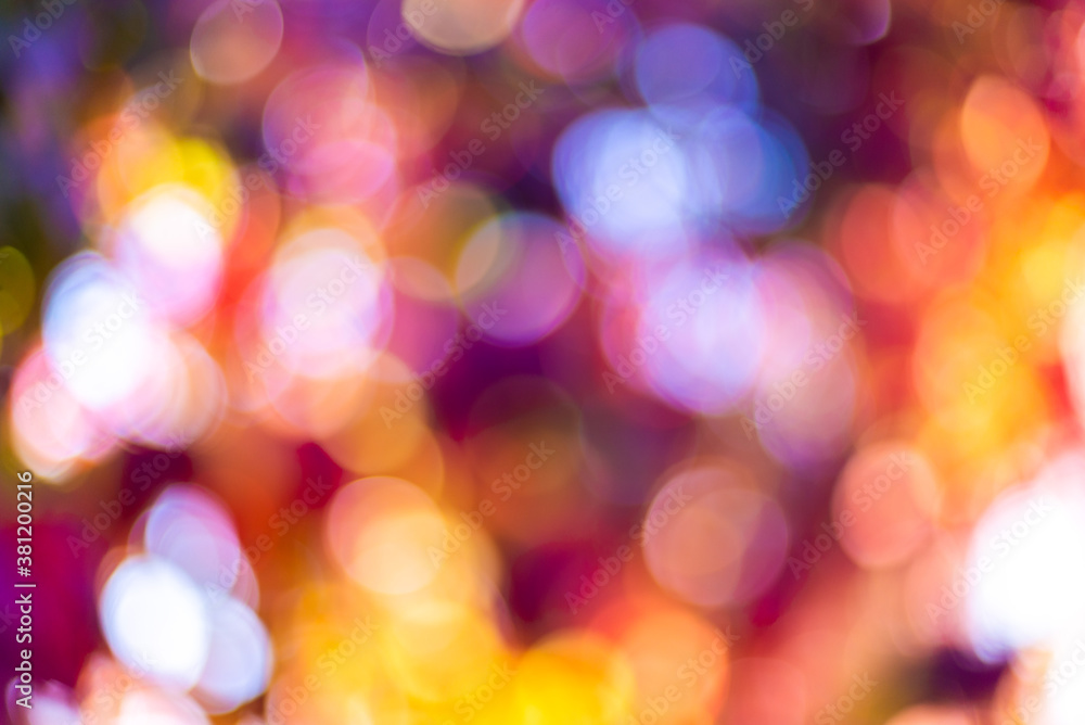 Autumn natural bokeh for background. Defocused abstract autumnal backdrop in yellow, red, orange and purple tones. Copy space. Space for text Autumn natural bokeh for background. Defocused abstract autumnal backdrop in yellow, red, orange and purple tones. Copy space. Space for text