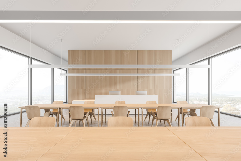 Fototapeta premium Table in modern white and wooden cafe interior