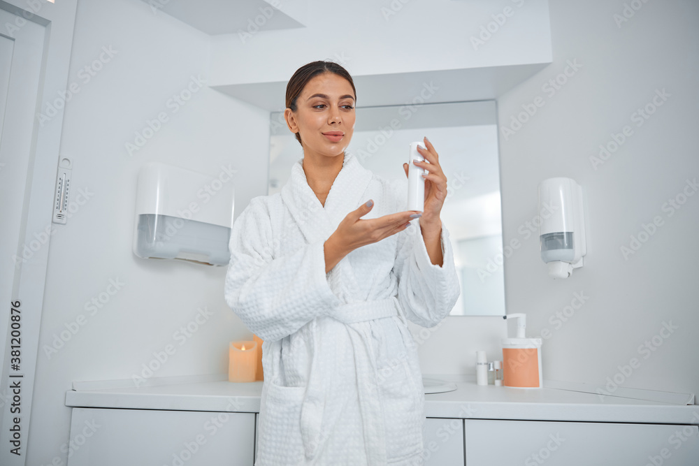 Beautiful healthy smiling caucasian woman is doing beauty procedures at spa and healthcare salon Beautiful healthy smiling caucasian woman is doing beauty procedures at spa and healthcare salon