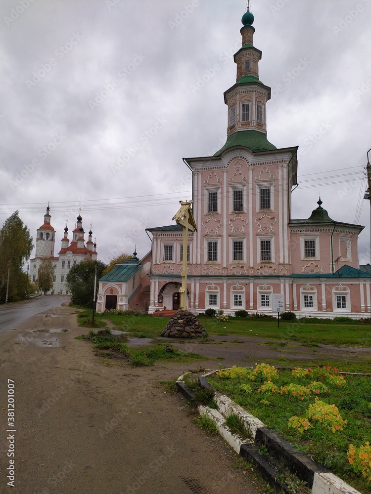 An old pink church in a small town in rainy weather,Russia,Totma